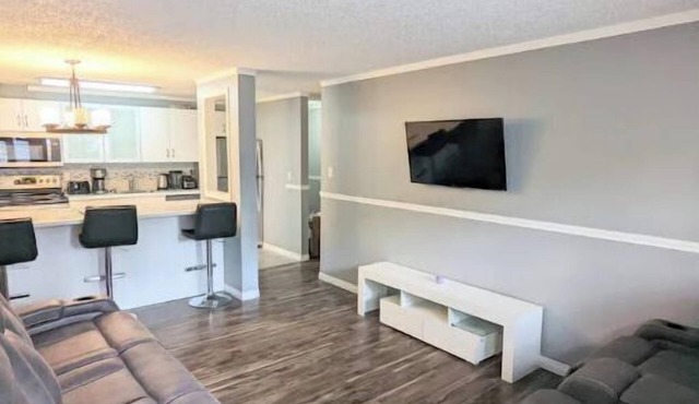 Fully furnished 2 bedroom condo w/free parking on premises