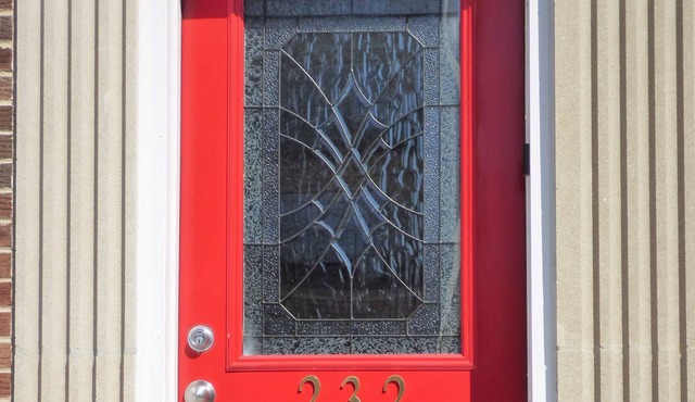 Fully Furnished and rehabbed townhouse with off-street parking and yard