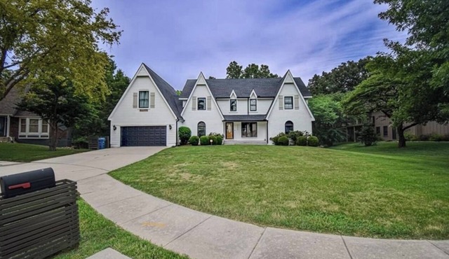 Fully furnished suite in basement with washer and dryer.