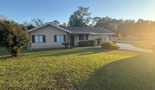 Fully loaded family and fur-baby friendly home in Pace.