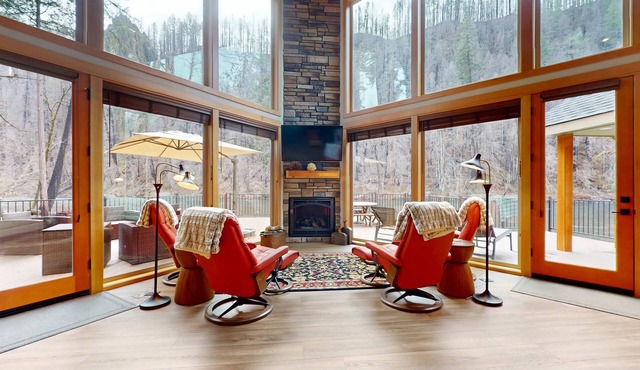 Fully rebuilt riverfront home with deck, fireplace, & W&D - dog-friendly