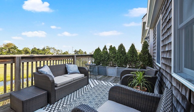 FULLY RENOVATED apt w/water views and deck near beach& marina