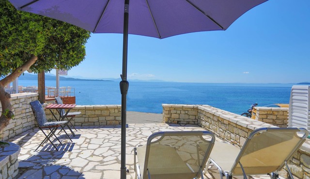 Fully Renovated Beachfront Dina: A/C, Private Terrace, WiFi