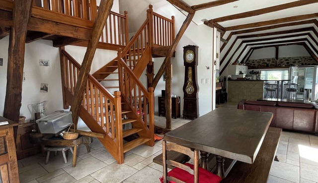 Fully restored stone and slate barn in a typical village