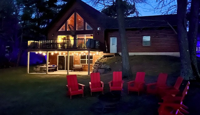 Fully stocked LAKE house! Canoes, Kayaks, Paddle boat, Level frontage.