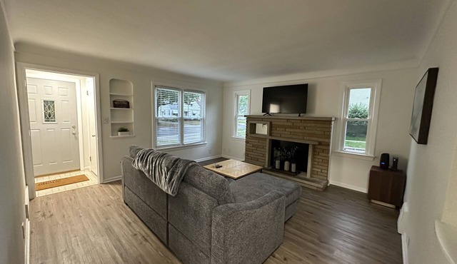 Fully updated house with a fenced in yard and close to highways and hospitals!