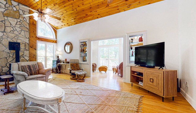 Fun getaway on three wooded acres with furnished deck & forest views