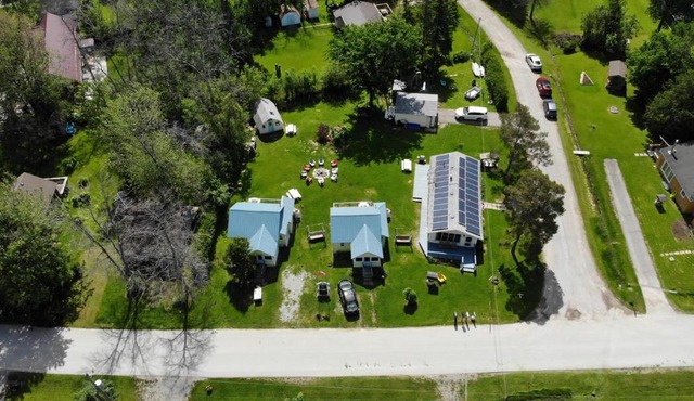 Fun Place with a Sandy Beach for Swimming, Boating & Fishing, Featuring 1 House and 3 Cabins