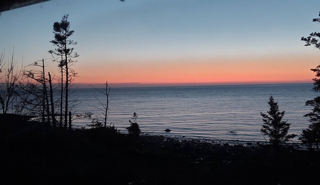 Fundy Fantasy Oceanfront Cabin. Offgrid romantic getaway.