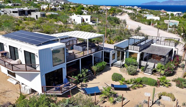 Funnest house in Baja! Game nights w/smart darts, shuffleboard, & video games. Enjoy a new 8 person hot tub, lounge on multiple decks w/firepits, fast Wifi (250 mb+)w/Starlink backup. Use of 2 SUPs. Daily housekeeping optional.