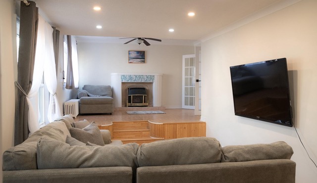 Furnished spacious 2 bedroom 1 bathroom main level of a house