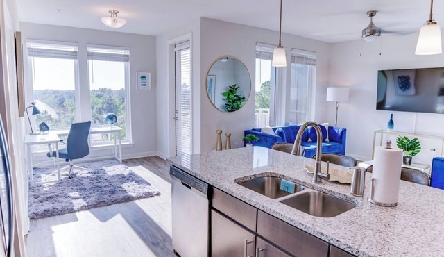 Fusion 1406 · Top floor modern getaway w/resort amenities!