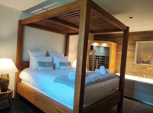 Géraniums Et Neige Fraîche, Maison d'Hôtes avec balnéo massante et sauna privatifs dans certaines suites haut standing