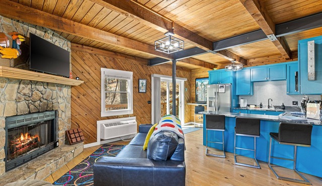 Gaming-themed cabin in Blairsville with arcade consoles & foosball