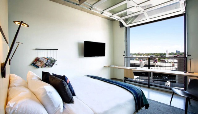 Garage Door King at The Source Hotel, Outdoor Pool, Parking, Pets Allowed