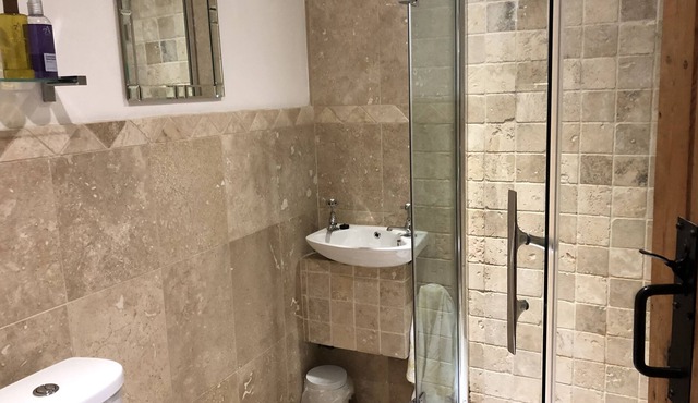 Garden Bank Cottage , on ground level, two bedrooms with two shower rooms