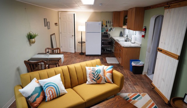 Garden level 1-bedroom apartment, private entrance. Month-to-month.