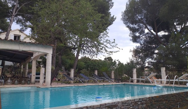 Garden level in villa with swimming pool