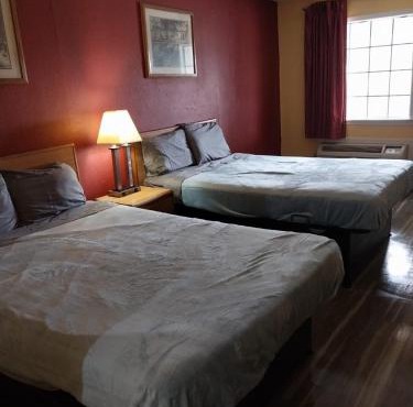 Gated 2 Double Beds Hotel Room 122