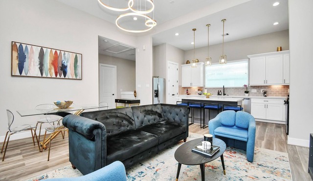 Gated, Comfy & Modern 3 BDR Townhome Centrally located near Airport.