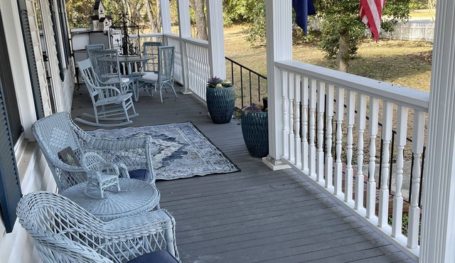 Gated property with historic main home + charming cottage.