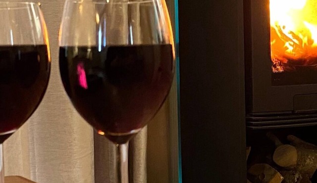 Gatehouse Lodge a bespoke Lodge on working farm with a distant sea view and a secluded garden with fire.