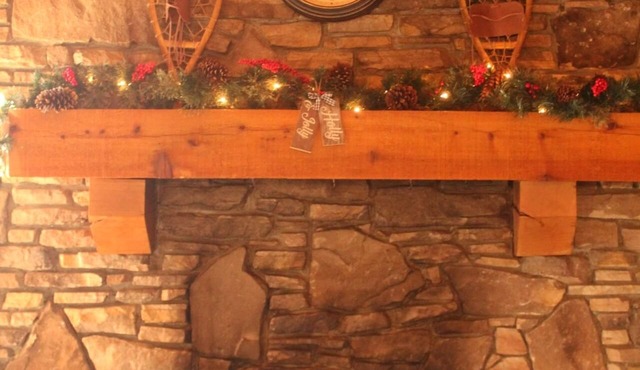 Get cozy for the winter in this 3 floor, 4 bedroom rustic ski home