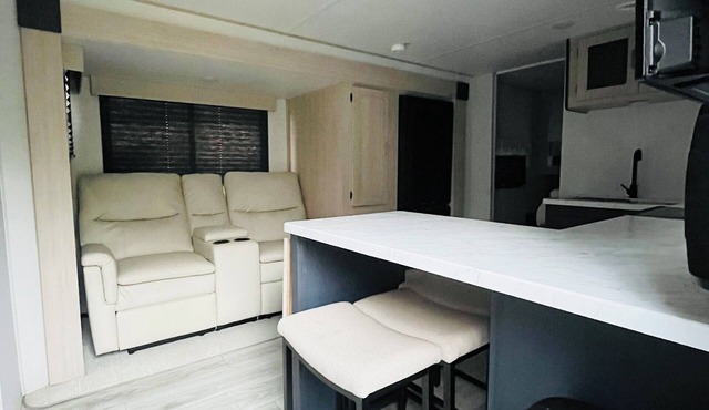 Get Cozy in Crockett with a Relaxing Stay in a 4 Person RV- Outdoor Fireplace