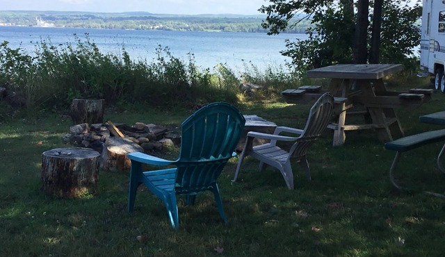 Get lulled to sleep by Lake Superior in Vintage camper 5 steps from the water