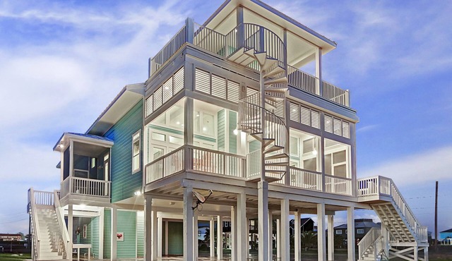 Get the best of both worlds, beach & bay, in this luxurious waterfront home.