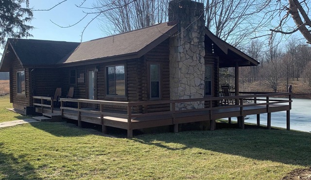 Getaway and snuggle up with a loved one in a cabin and a fire