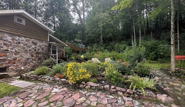 Getaway on famous Spring Creek, minutes from Beaver Stadium and State College.