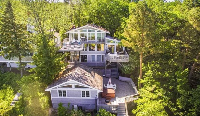 Gigantic lakefront home with private hot tub, washer/dryer, AC, deck, & firepit