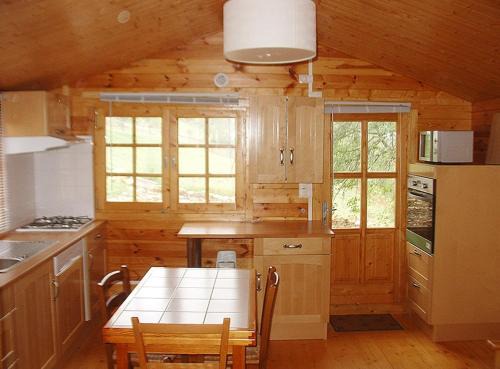 GITE LES SOURCES PETIT CHALET 2P et BB