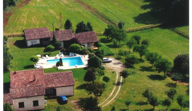 Gite with large swimming pool, play area, green space.
