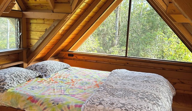 Glam camping in a private artistic solar eco-cabin