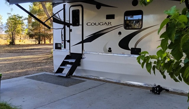 Glamorous camping in a beautiful like new 24' Cougar near Death Valley.