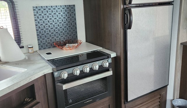 Glamping at its finest! Come Glamp with us in this beautiful RV that sleeps 10!