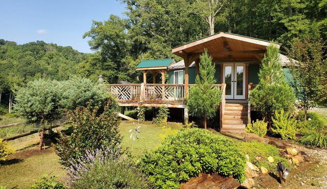 Glamping at its finest - riverfront yurt, 30-minutes west of Asheville
