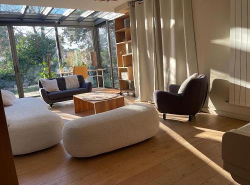 Glass and wood designer villa with garden in centertown