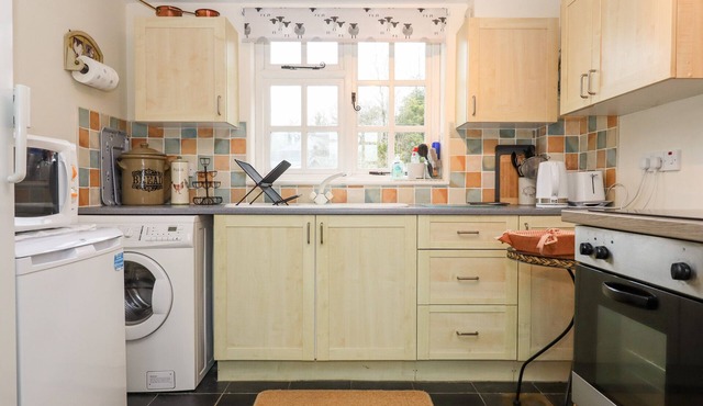 GLEBE FARM COTTAGE, pet friendly, with a garden in Sheepwash