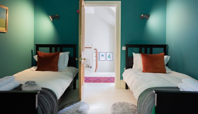 Glen Lodge and Abhainn Cottage, fully refurbished in 2018, offers a warm and spacious setting sleeping 6. Ideal for wild swims and outdoor adventures. Sleeping 6 with a wood fired hot tub.