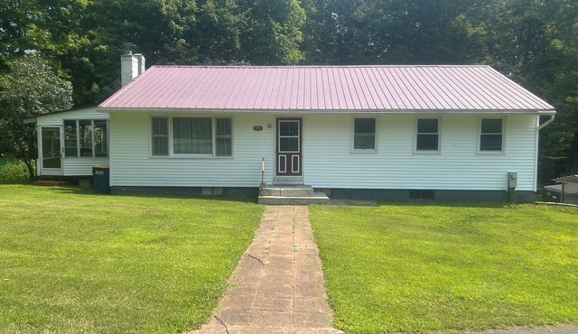 Glenmore Creek, ranch style home located on 10, mostly wooded, private acres.