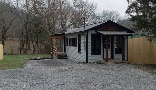 "Going postal" Historical post office turned into charming tiny home.