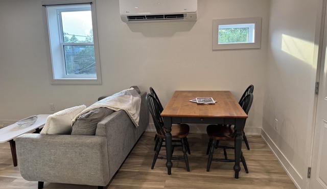 Golden Acre Suites | 2BR Downtown w/Exposed Brick & Retro Retreat