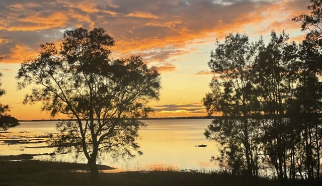 Golden Sunrise Lake Front View Recent Reno
