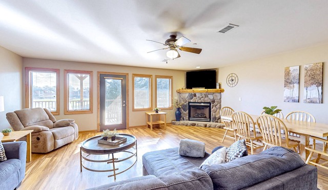 Golf course-front condo with pool, hot tub, dock, tennis, golf, & private beach