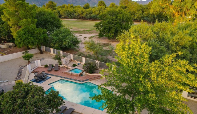 Golf course-front home with private heated pool, spa, mtn views, golf on site