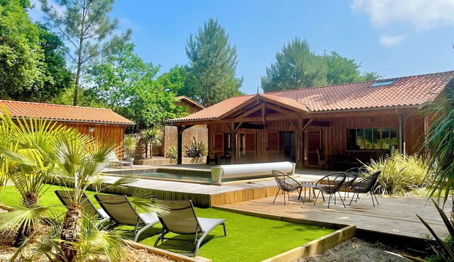 GOLF de Bisca, wooden villa, lake on foot, heated SWIMMING POOL, 4-star rating.
