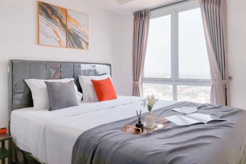 Good and Comfortable 1BR at Tamansari Bintaro Mansion Apartment By Travelio